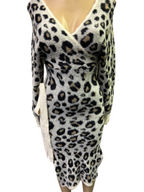 Wild & Cozy: The Leopard Print Sweater Dress